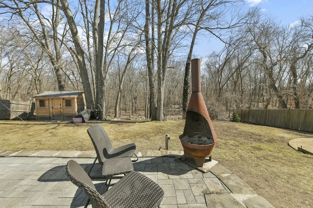 211 Pearl Street Reading, MA 01867 - Photo 29 of 34 a view of backyard of the house