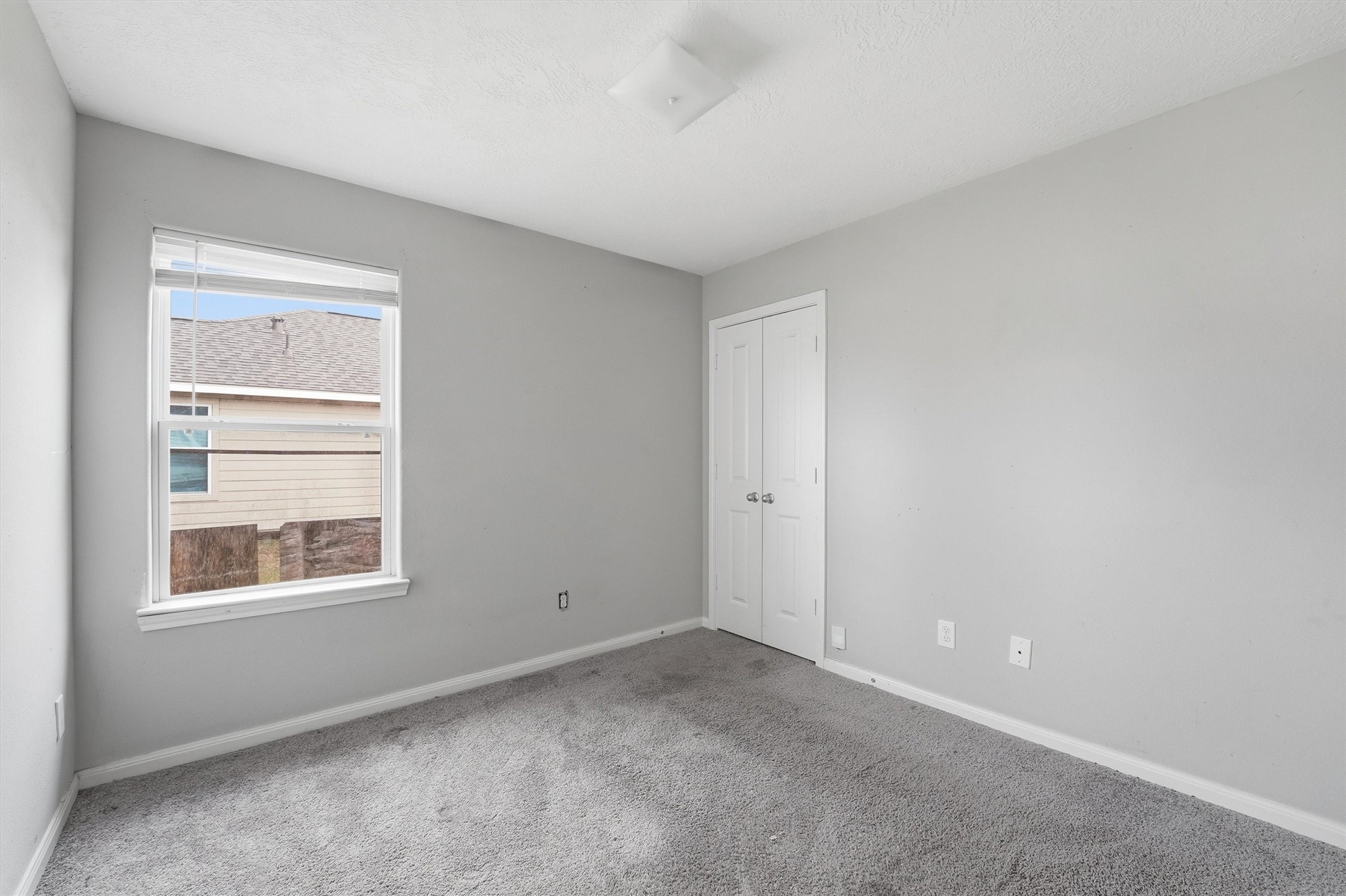 47 Road 5103 Cleveland, TX 77327 - Photo 20 of 33 a view of an empty room with a window