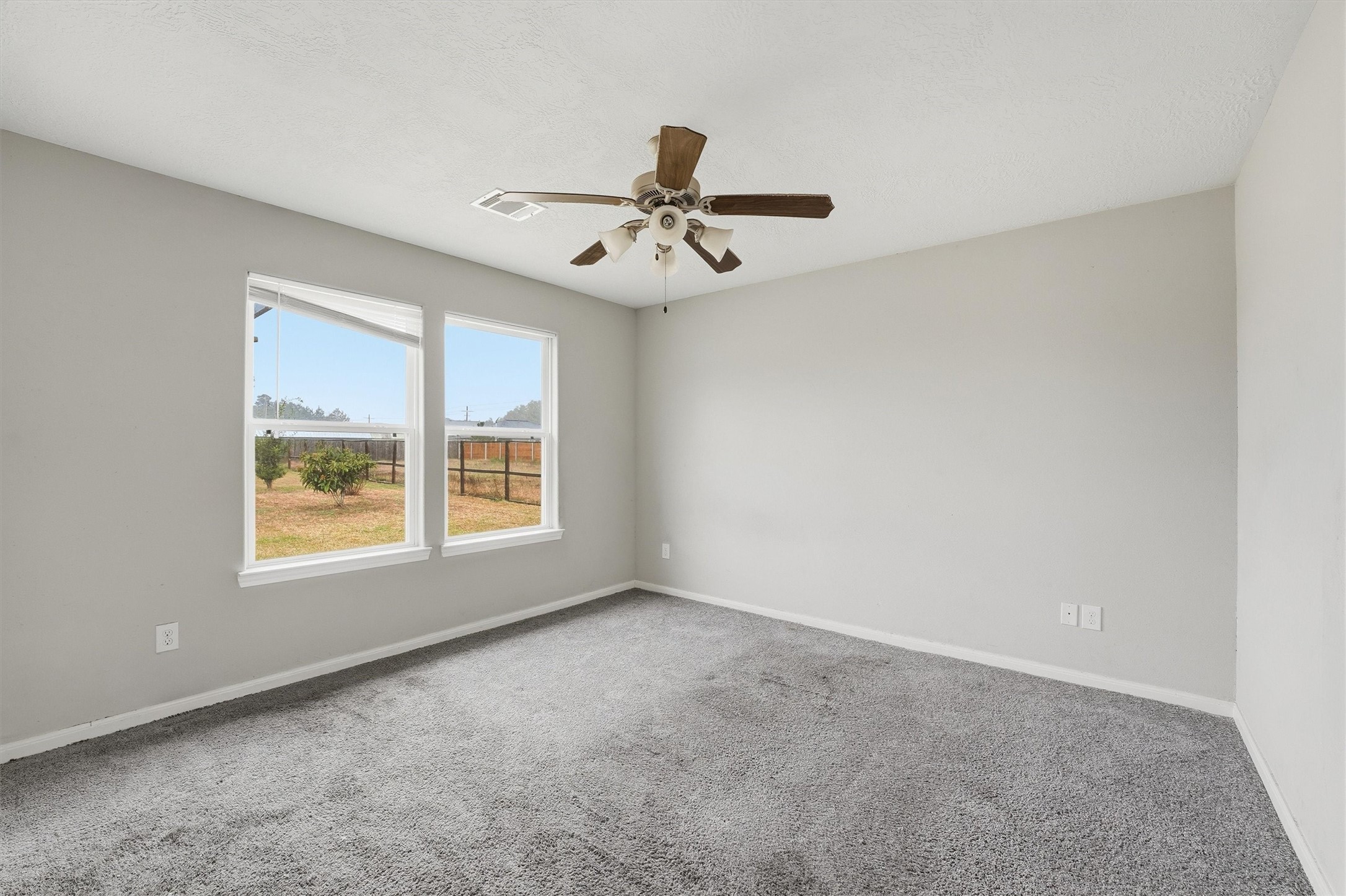 47 Road 5103 Cleveland, TX 77327 - Photo 24 of 33 a view of an empty room with a window
