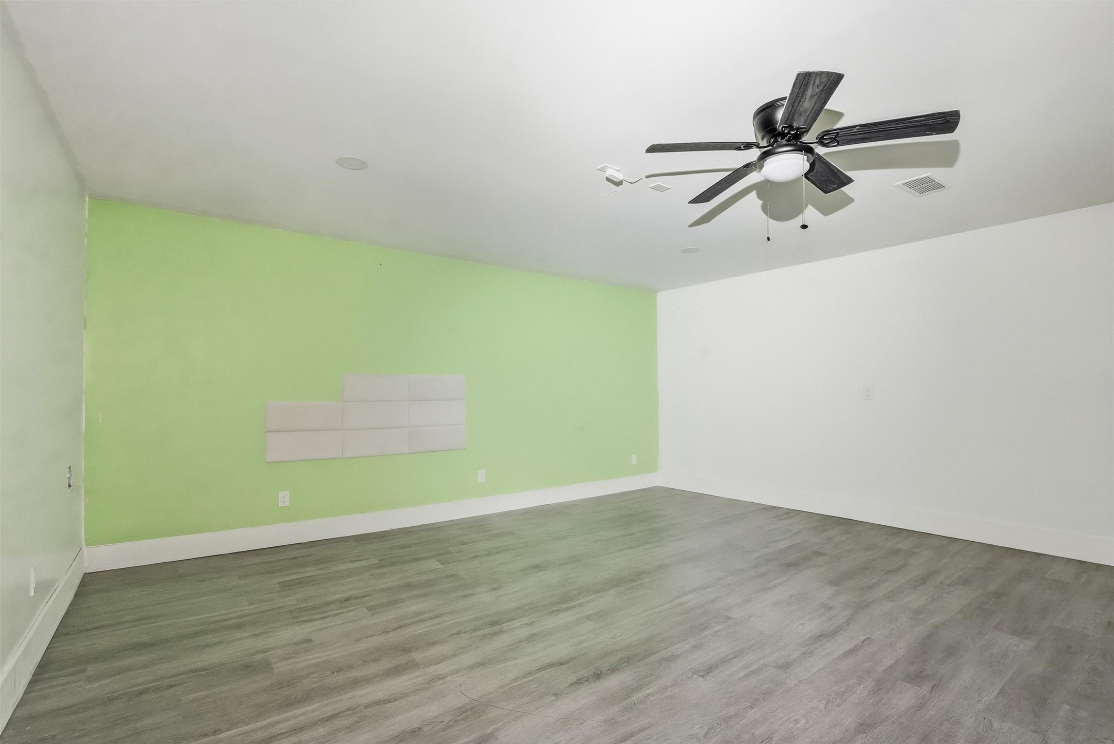 47 Road 5103 Cleveland, TX 77327 - Photo 32 of 33 a view of a room with wooden floor