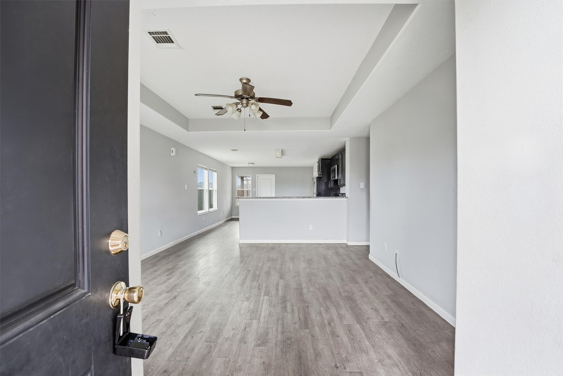 47 Road 5103 Cleveland, TX 77327 - Photo 5 of 33 a view of livingroom with hardwood floor and a ceiling fan