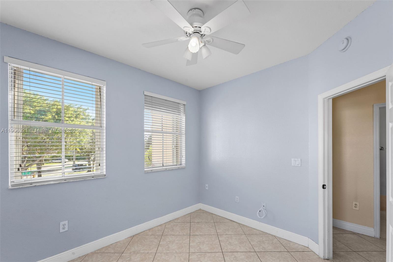 12513 Southwest 121st Way Miami, FL 33186 - Photo 28 of 37 a view of an empty room with a window