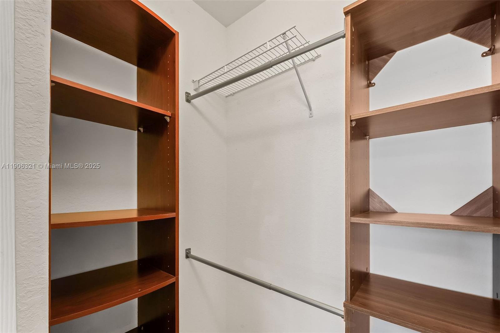 12513 Southwest 121st Way Miami, FL 33186 - Photo 31 of 37 a view of walk in closet