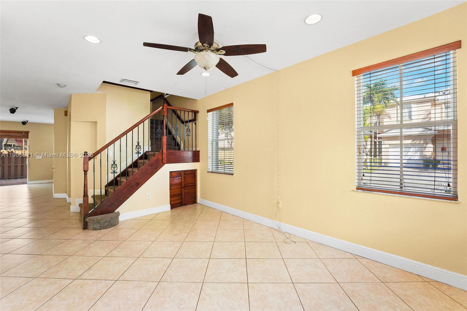 12513 Southwest 121st Way Miami, FL 33186 - Photo 7 of 37 a view of an entryway with wooden floor