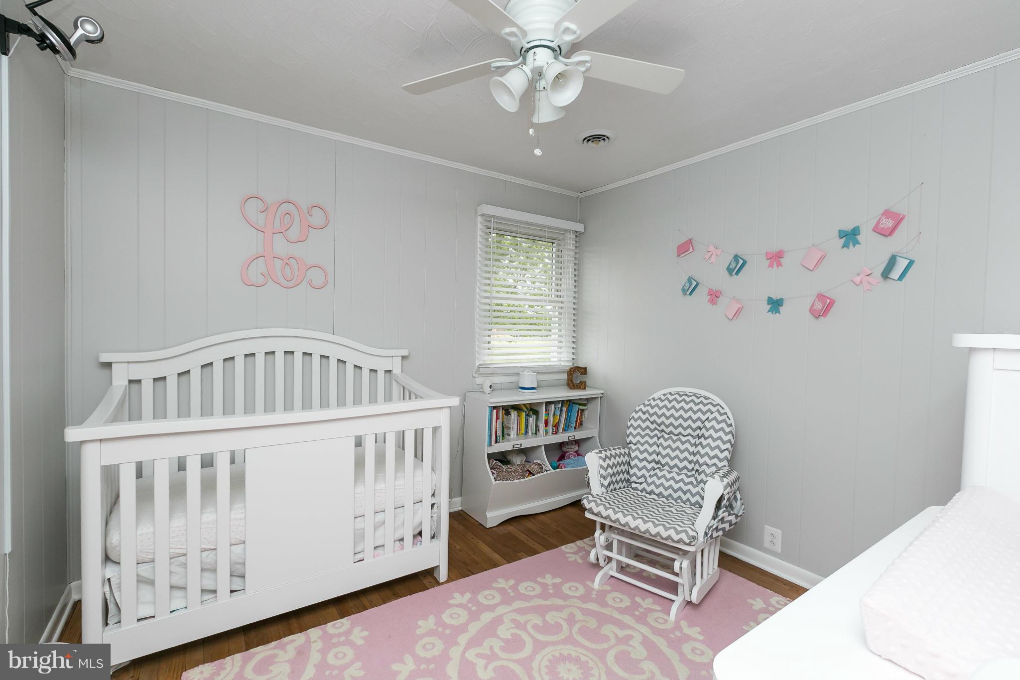 21217 Ridge Road Freeland, MD 21053 - Photo 15 of 29 a bedroom with furniture and a window