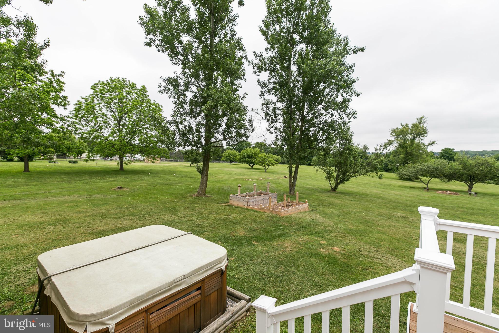 21217 Ridge Road Freeland, MD 21053 - Photo 20 of 29 a view of a park with trees and wooden fence