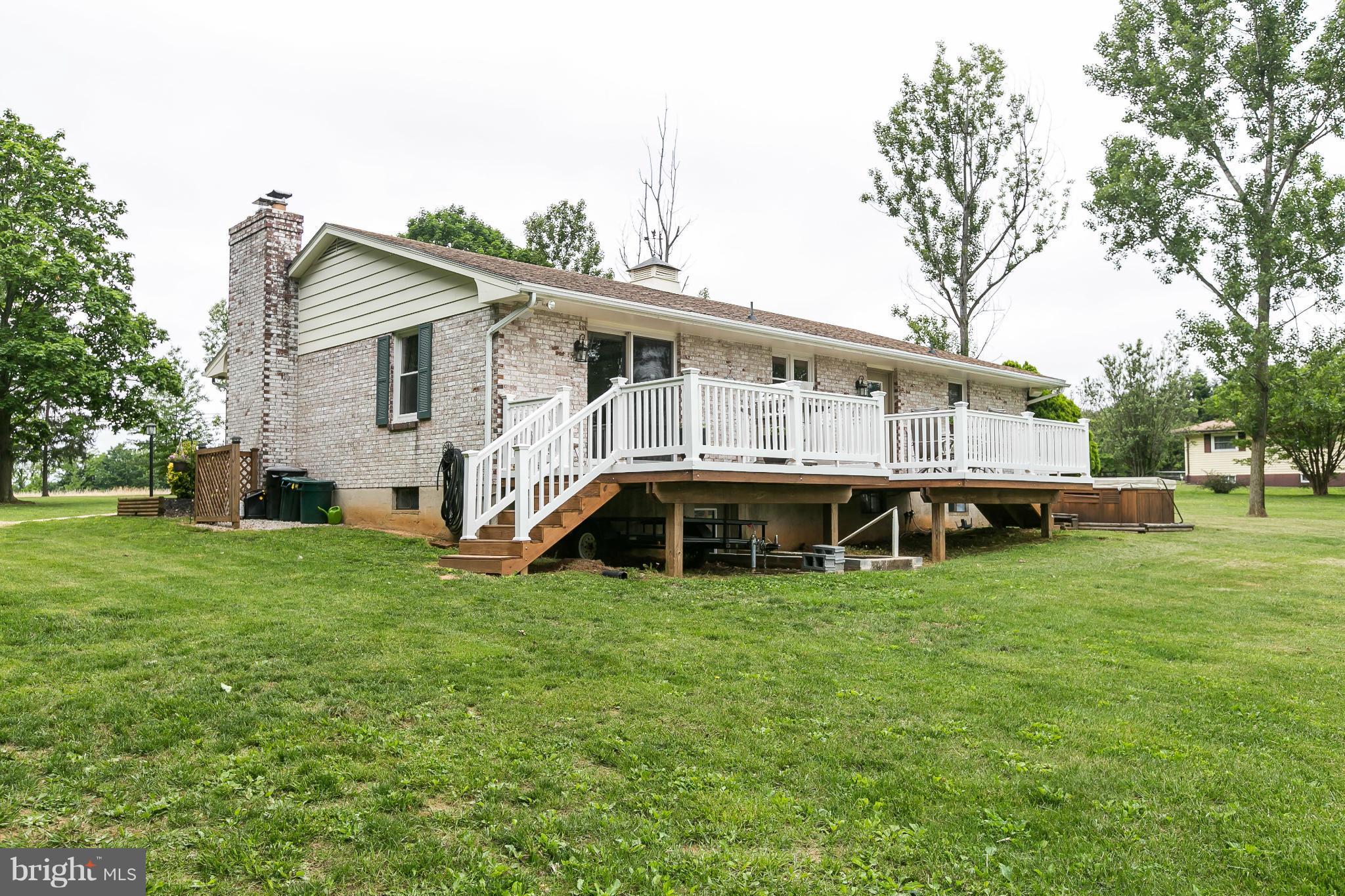 21217 Ridge Road Freeland, MD 21053 - Photo 25 of 29 a view of a house with a big yard and sitting area