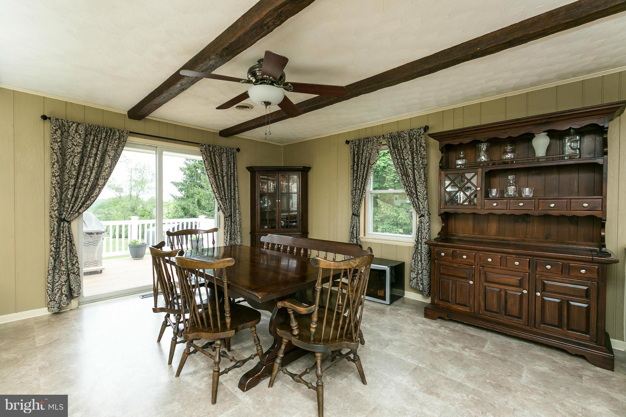 21217 Ridge Road Freeland, MD 21053 - Photo 5 of 29 a view of a dining room with furniture window and outside view