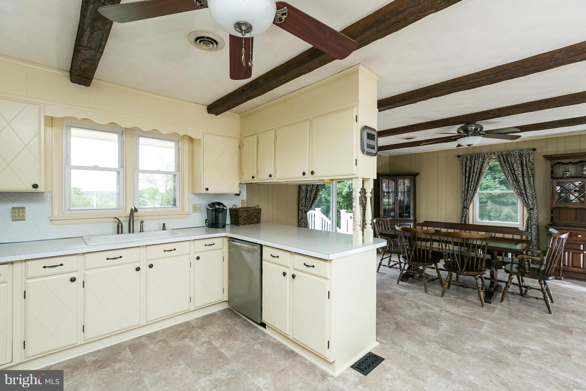 21217 Ridge Road Freeland, MD 21053 - Photo 7 of 29 a kitchen with sink and cabinets