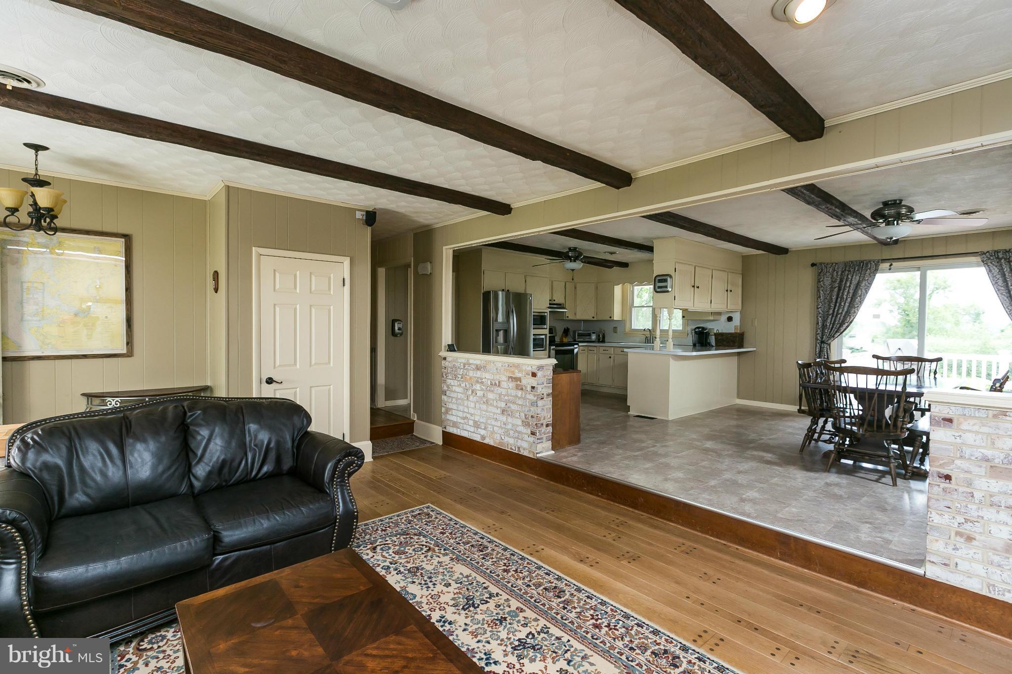 21217 Ridge Road Freeland, MD 21053 - Photo 8 of 29 a living room with furniture and a table