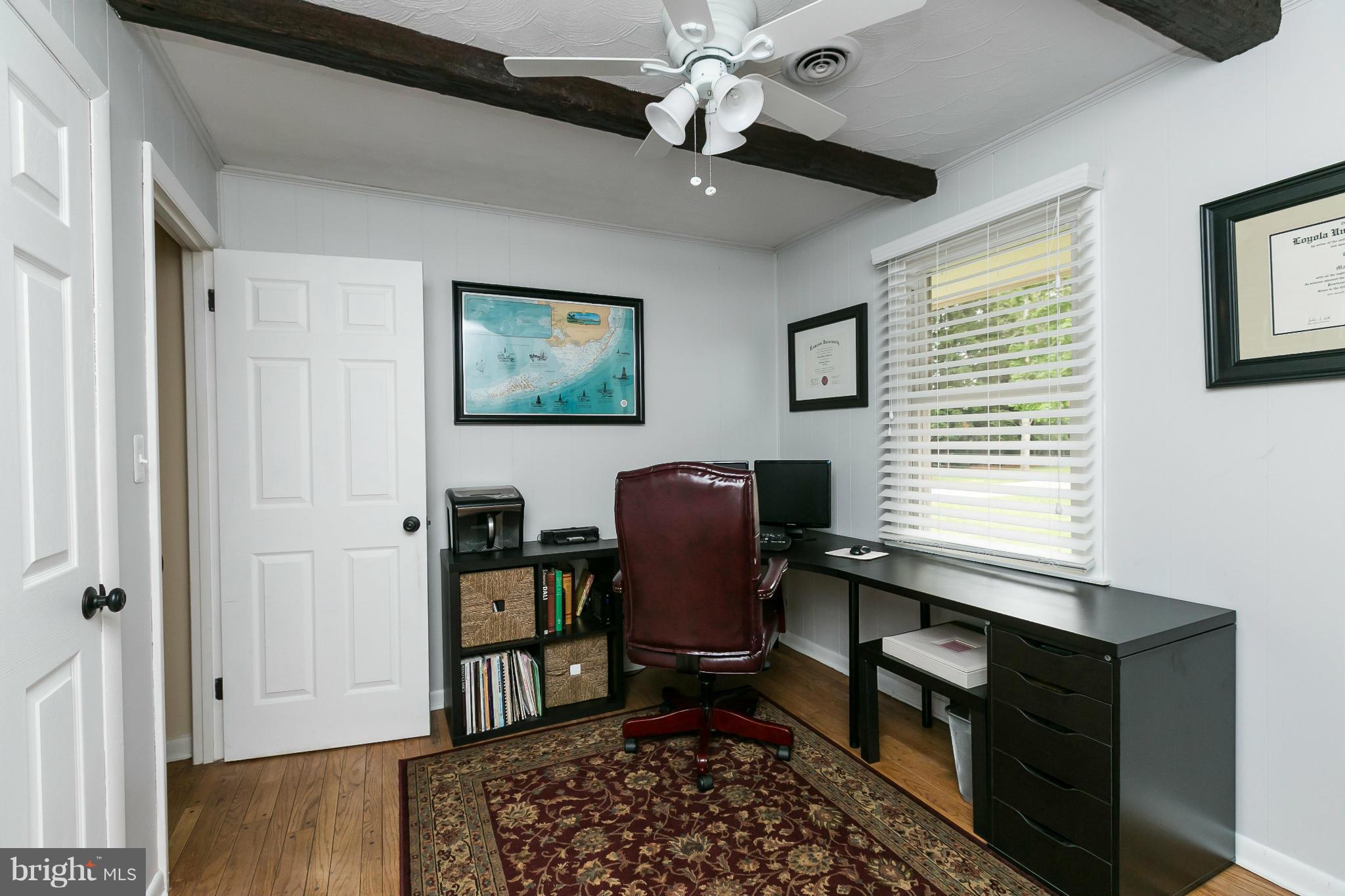 21217 Ridge Road Freeland, MD 21053 - Photo 10 of 29 a view of a workspace with furniture and a window