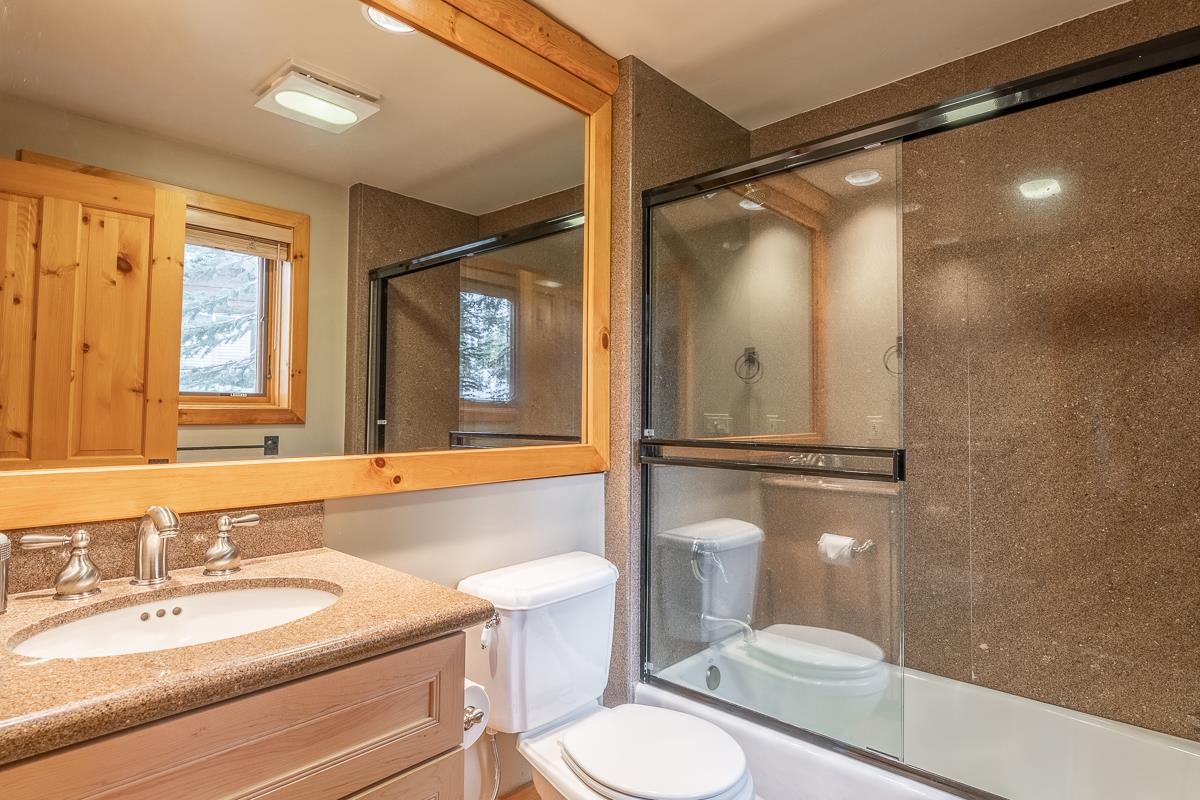 629 John Muir Road Mammoth Lakes, CA 93546 - Photo 33 of 49 a bathroom with a sink a toilet and shower