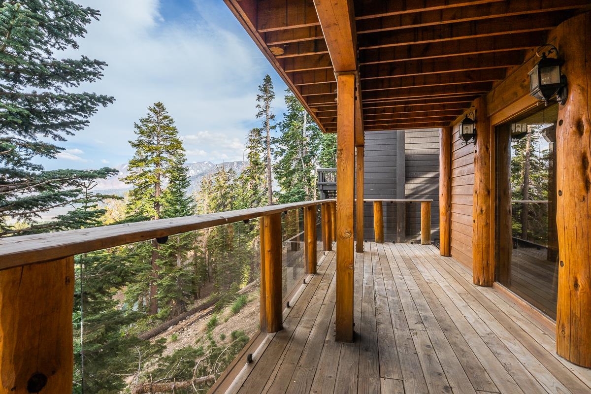 629 John Muir Road Mammoth Lakes, CA 93546 - Photo 35 of 49 a view of balcony with wooden floor and fence