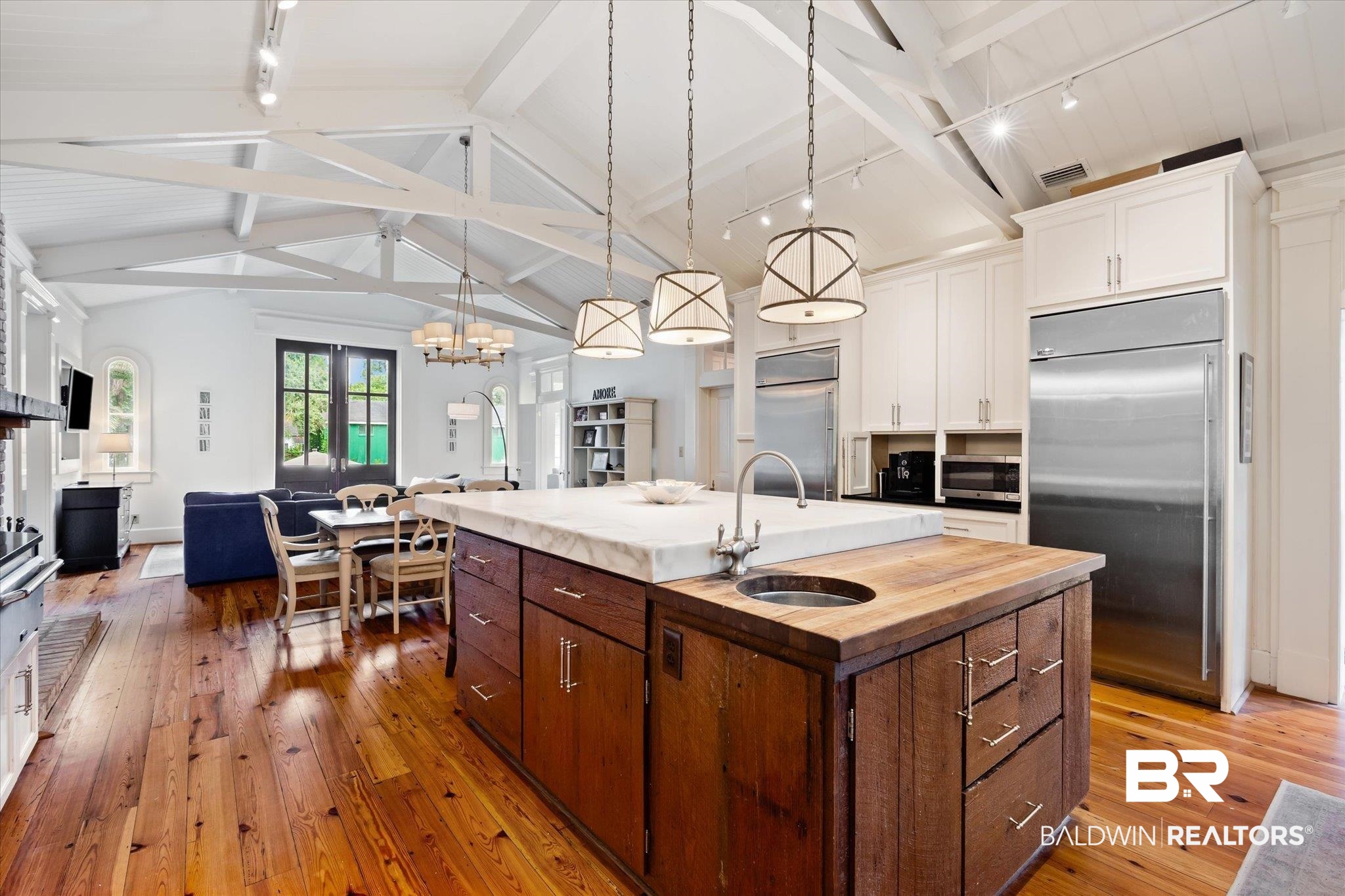 2205 Spring Hill Avenue Mobile, AL 36607 - Photo 10 of 59 Kitchen with hardwood / wood-style flooring, sink, a center island with sink, appliances with stainless steel finishes, and track lighting