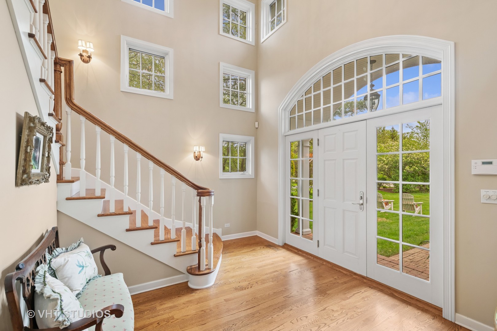 11 Longmeadow Road Winnetka, IL 60093 - Photo 5 of 31 a view of an entryway with wooden floor and windows