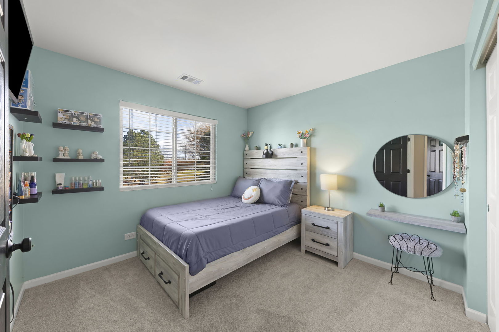 2263 Reflections Drive Aurora, IL 60502 - Photo 20 of 31 a spacious bedroom with a bed a mirror and windows