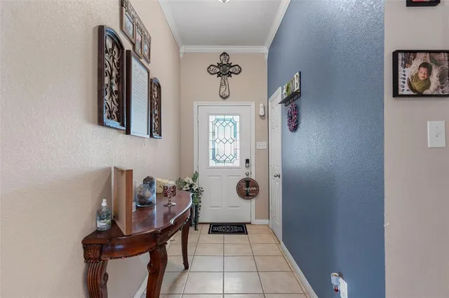 a view of a hallway with seating area