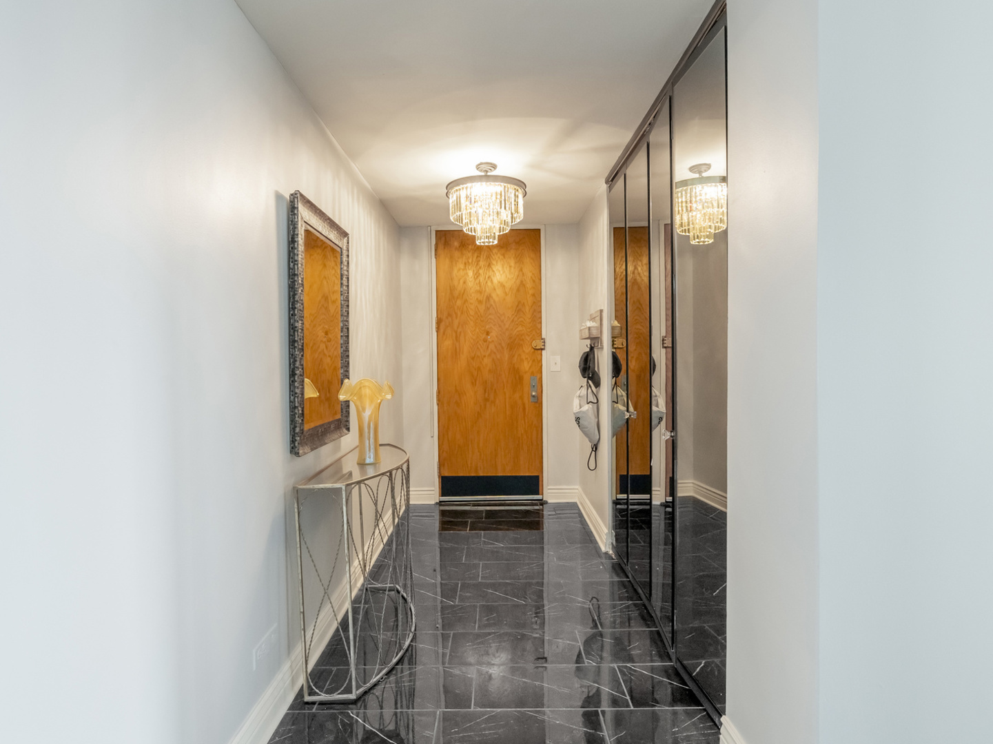 5201 South Cornell Avenue, Unit 27D Chicago, IL 60615 - Photo 14 of 35 a view of hallway with stairs