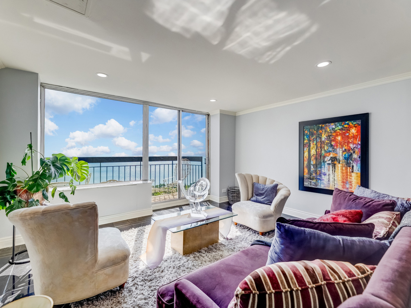 5201 South Cornell Avenue, Unit 27D Chicago, IL 60615 - Photo 3 of 35 a living room with furniture and a large window