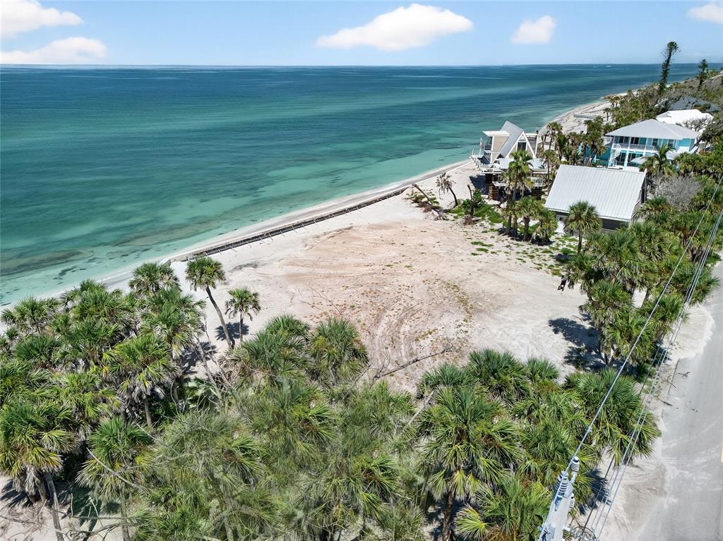 7160 Manasota Key Road Englewood, FL 34223 - Photo 14 of 17 a view of a lake with a beach