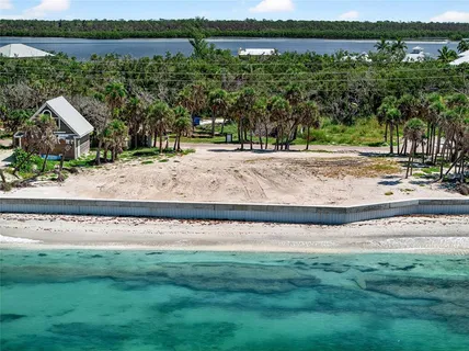 a view of a yard with a lake view