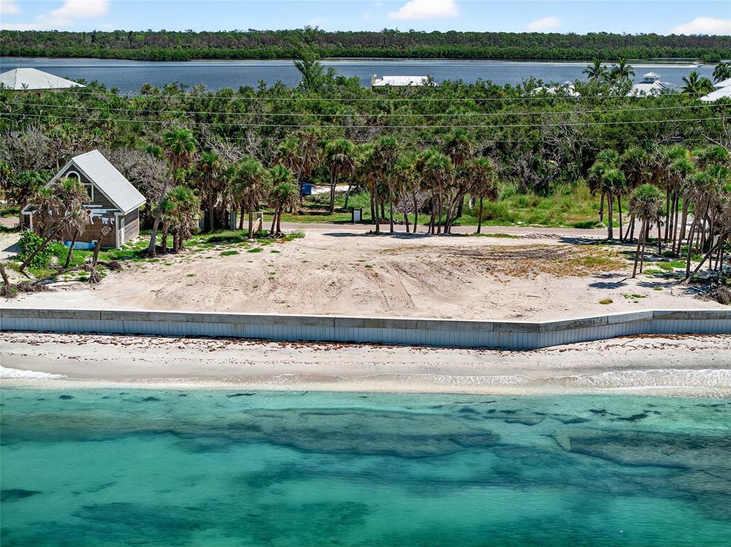 7160 Manasota Key Road Englewood, FL 34223 - Photo 3 of 17 a view of a yard with a lake view