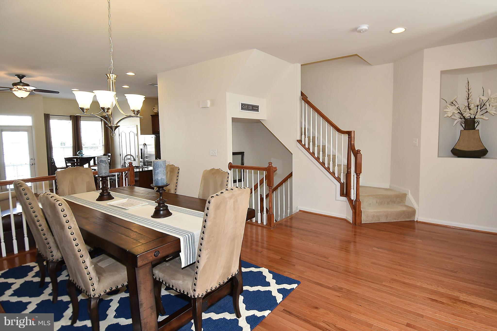 22641 Twitter Square Ashburn, VA 20148 - Photo 2 of 30 Elegant formal Dining Rm w/ hardwood floors