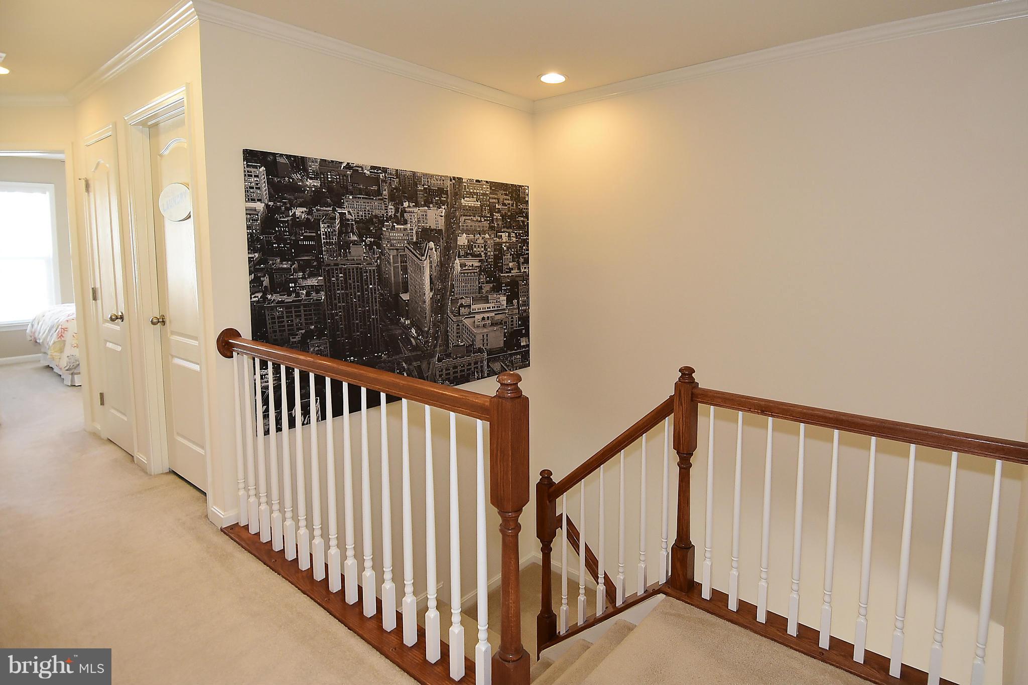 22641 Twitter Square Ashburn, VA 20148 - Photo 16 of 30 Upper level landing with recessed lighting