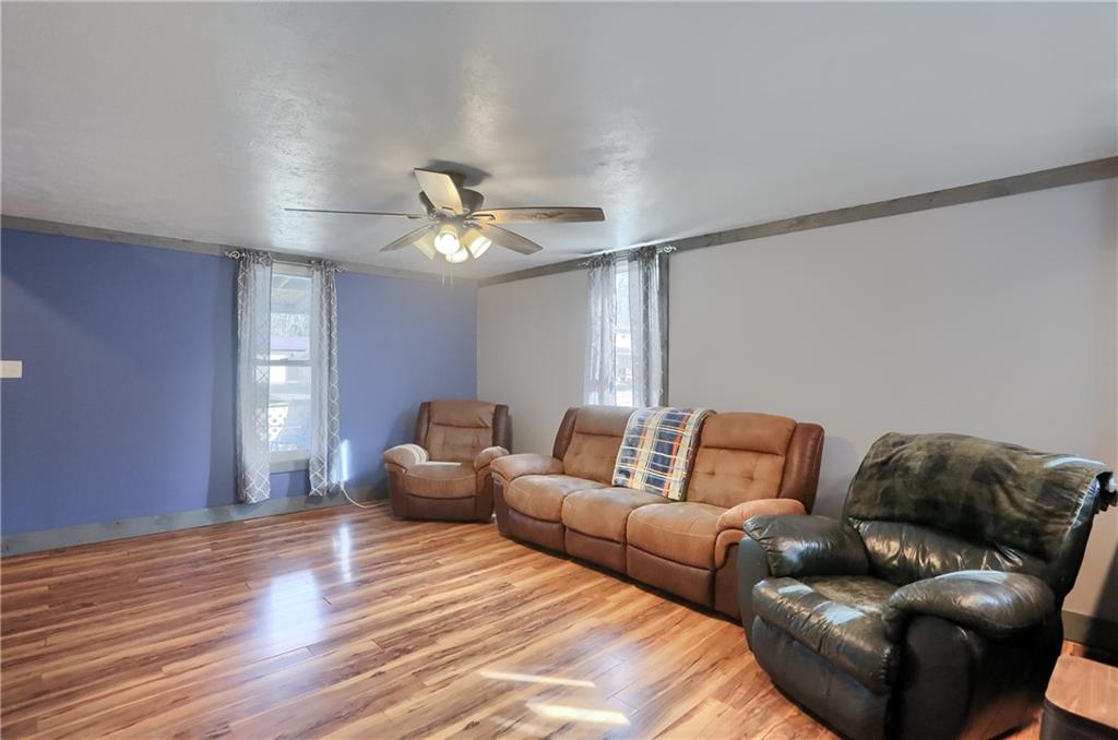 1204 Franklin Road Jackson Center, PA 16133 - Photo 13 of 26 a living room with furniture and a ceiling fan
