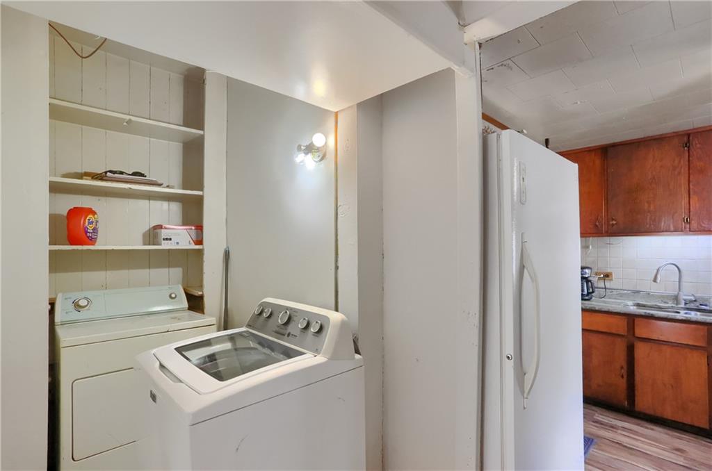 1204 Franklin Road Jackson Center, PA 16133 - Photo 17 of 26 a room with storage and utility