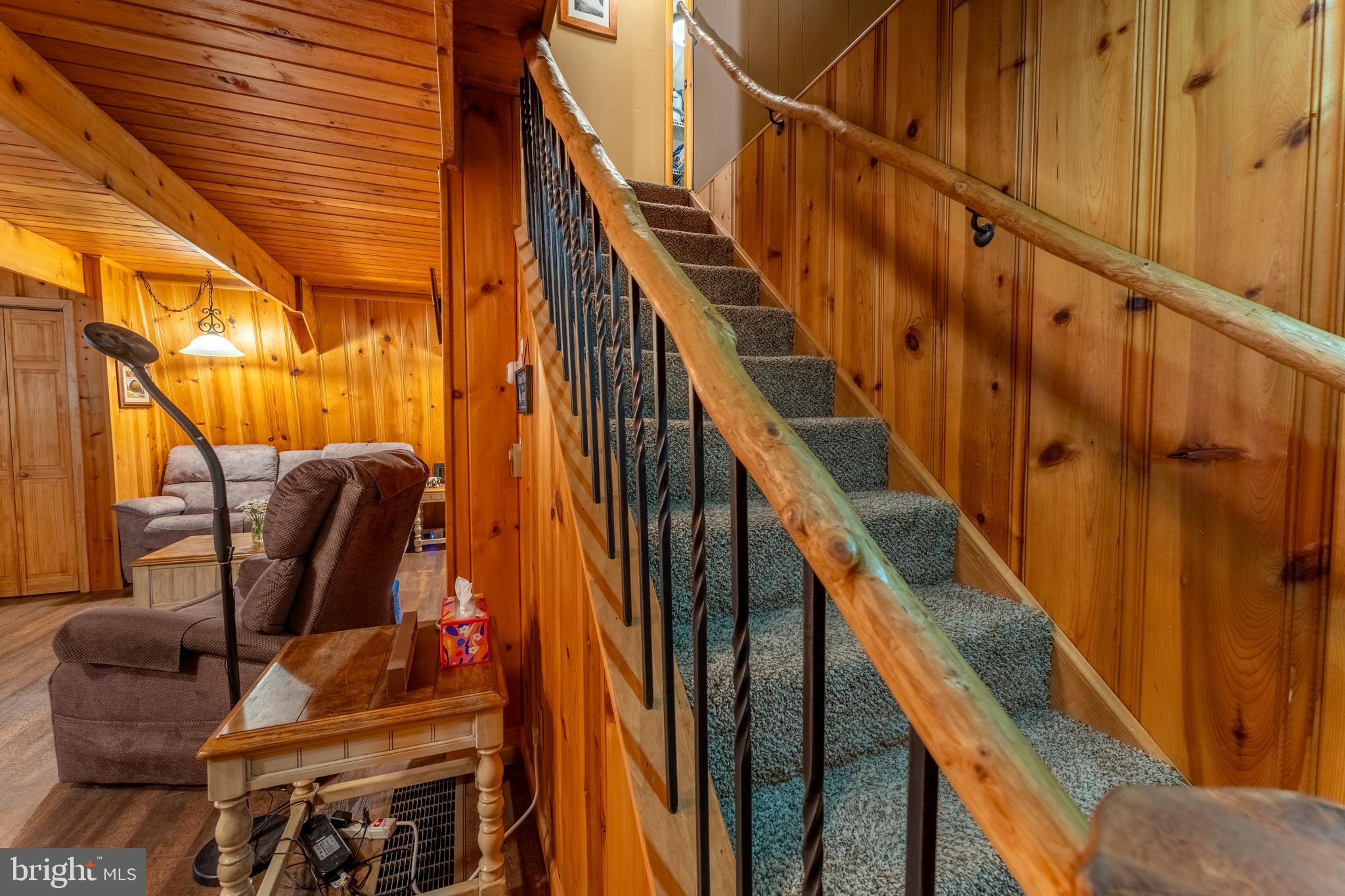 106 Oak Way Road Swanton, MD 21561 - Photo 15 of 47 Hand hewn rail to upper level