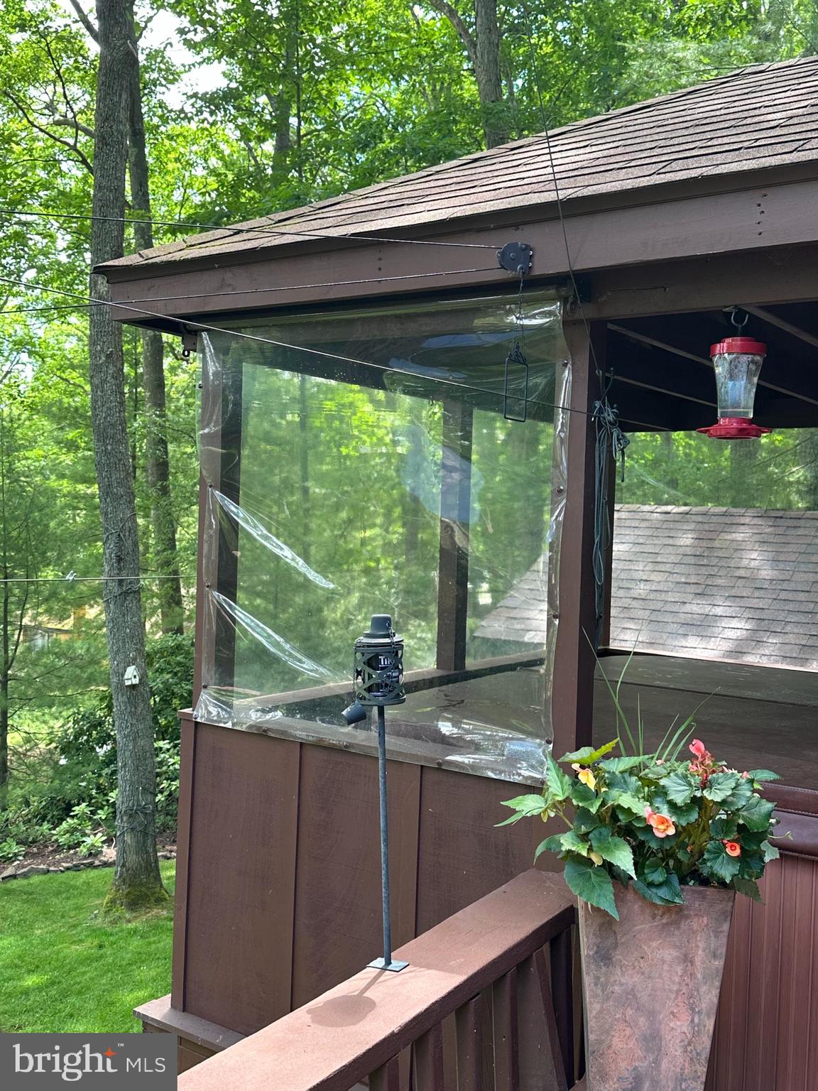 106 Oak Way Road Swanton, MD 21561 - Photo 29 of 47 Plastic curtains protect from the weather