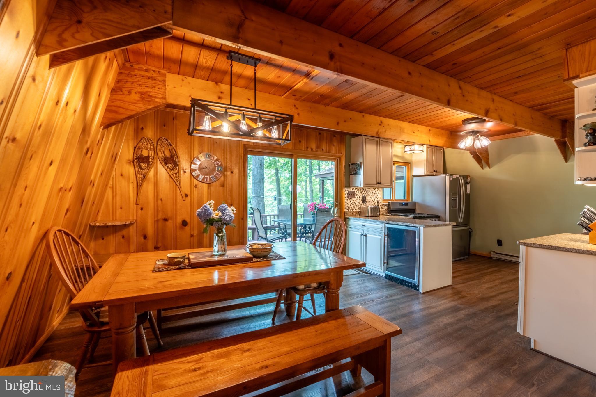 106 Oak Way Road Swanton, MD 21561 - Photo 9 of 47 Open dining area, slider to rear deck