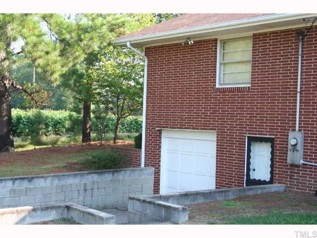 1200 Weldons Mill Road Henderson, NC 27537 - Photo 4 of 12 Garage door to workshop area in basement