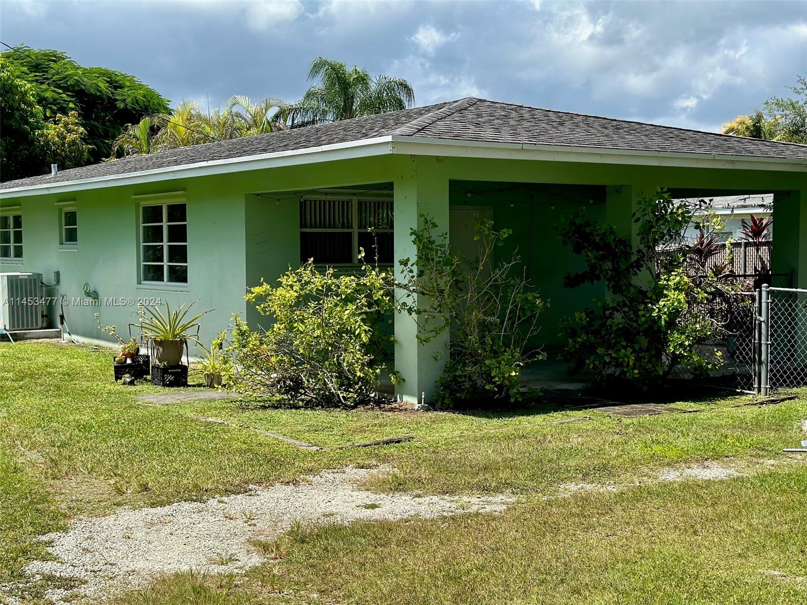 9320 Southwest 125th Terrace Miami, FL 33176 - Photo 3 of 31 a view of a house with garden