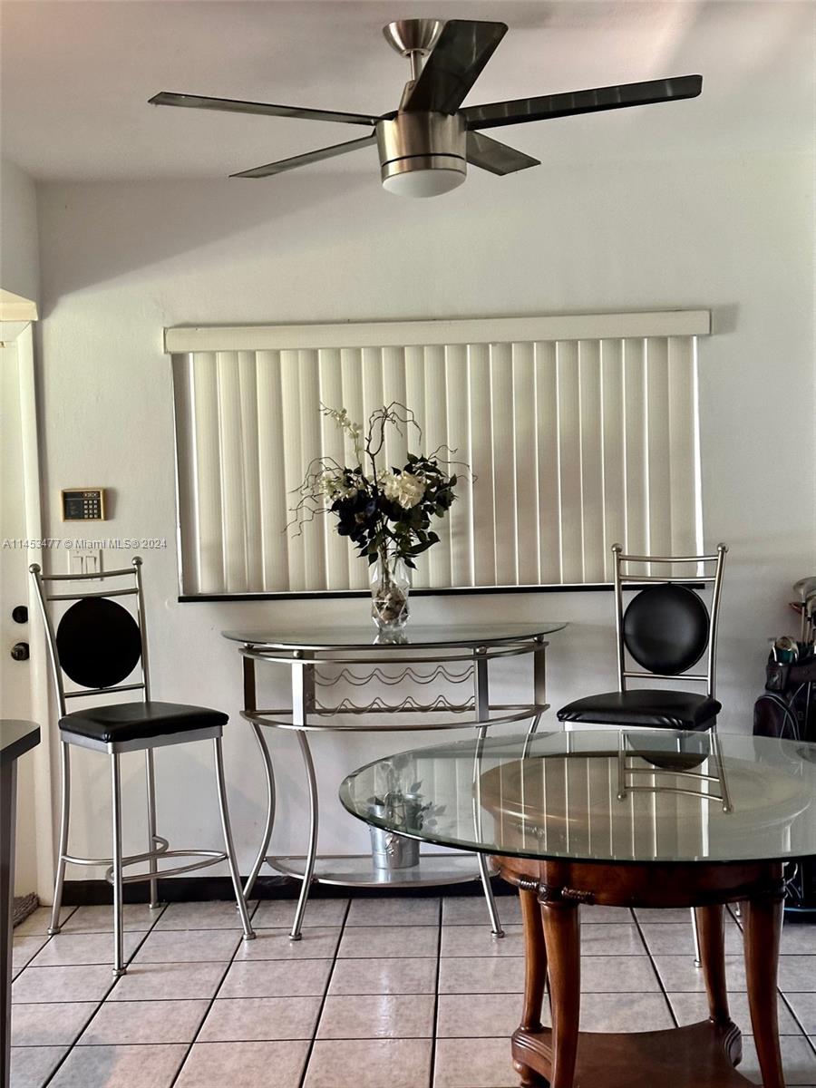 9320 Southwest 125th Terrace Miami, FL 33176 - Photo 10 of 31 a view of dinning room and chairs