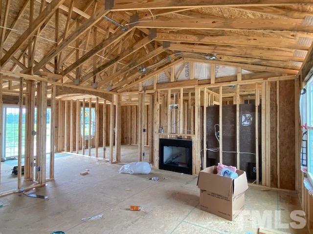 155 Mamie Road Benson, NC 27504 - Photo 3 of 23 a building outdoor space with patio furniture and potted plants