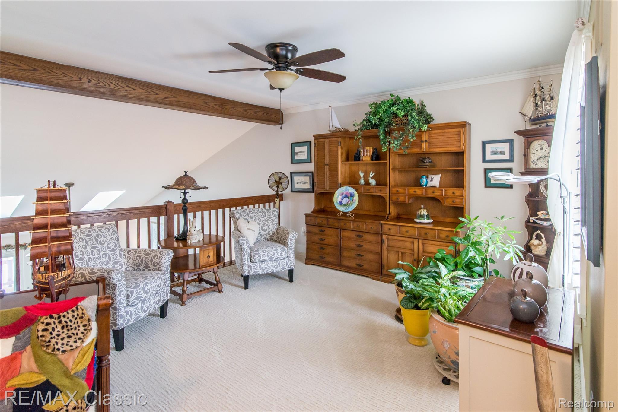 4655 Summer Ridge Drive, Unit 17 Howell, MI 48843 - Photo 9 of 34 Second floor loft overlooking the great room is the perfect space for a library to sitting room.