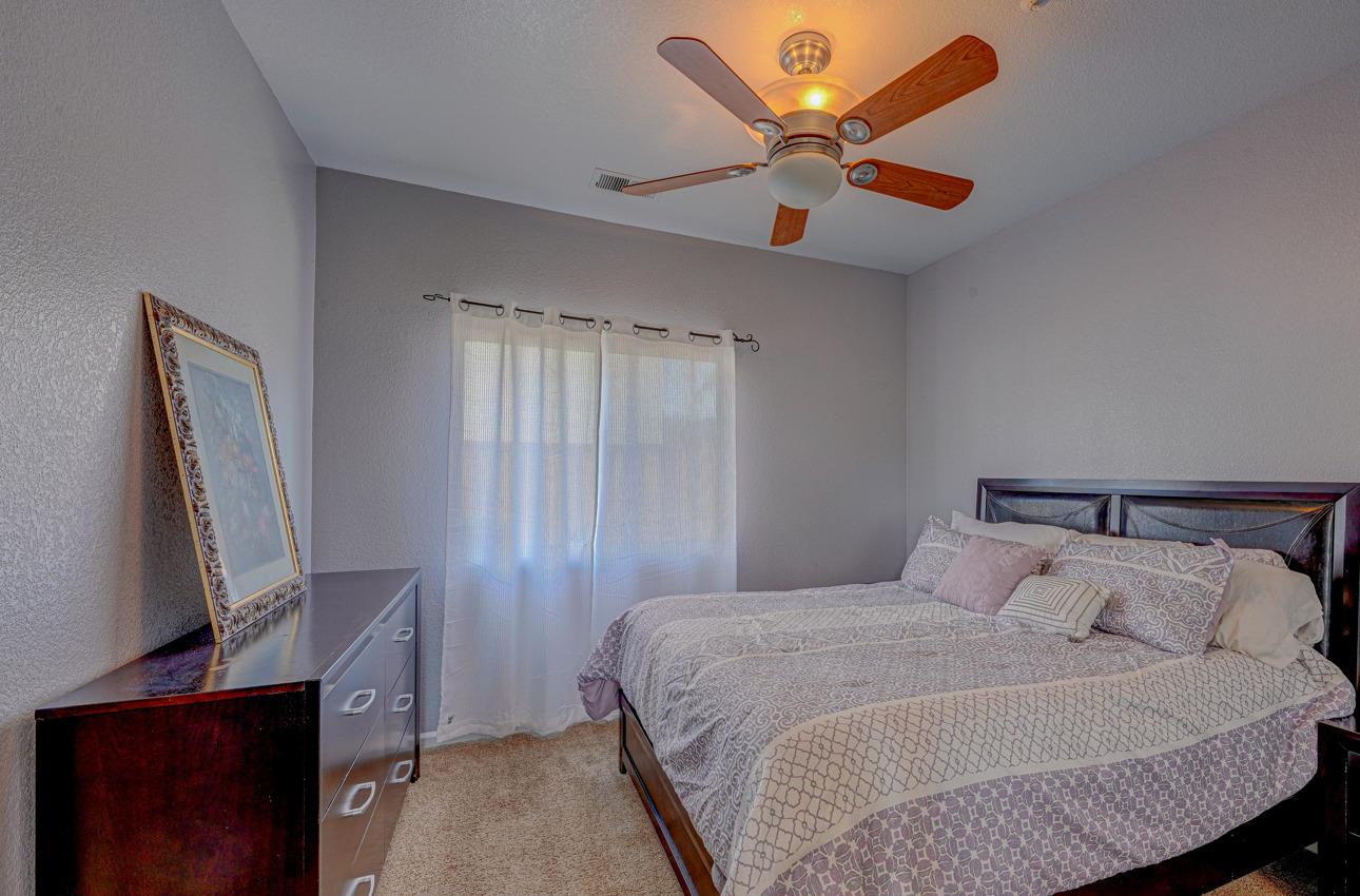 2 Whitman Circle Salinas, CA 93906 - Photo 19 of 41 a bedroom with a bed and a flat screen tv