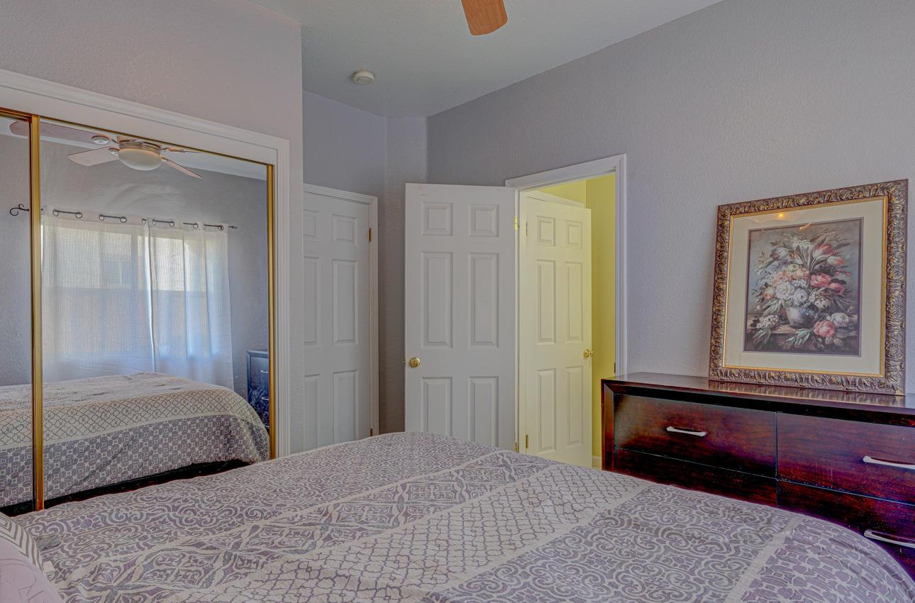2 Whitman Circle Salinas, CA 93906 - Photo 20 of 41 a bedroom with a bed and a painting on the wall