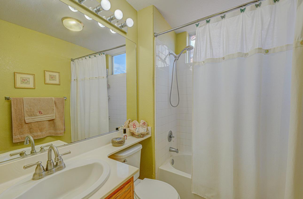 2 Whitman Circle Salinas, CA 93906 - Photo 21 of 41 a bathroom with a sink vanity mirror and toilet