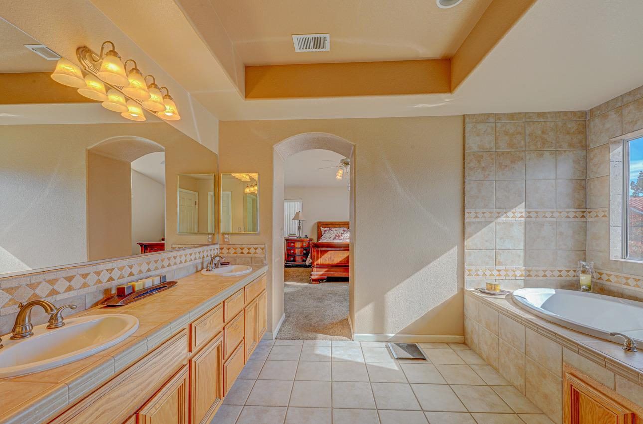 2 Whitman Circle Salinas, CA 93906 - Photo 31 of 41 a spacious bathroom with a sink mirror and vanity
