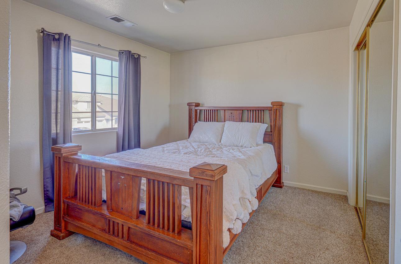 2 Whitman Circle Salinas, CA 93906 - Photo 35 of 41 a bed sitting in a bedroom next to a window