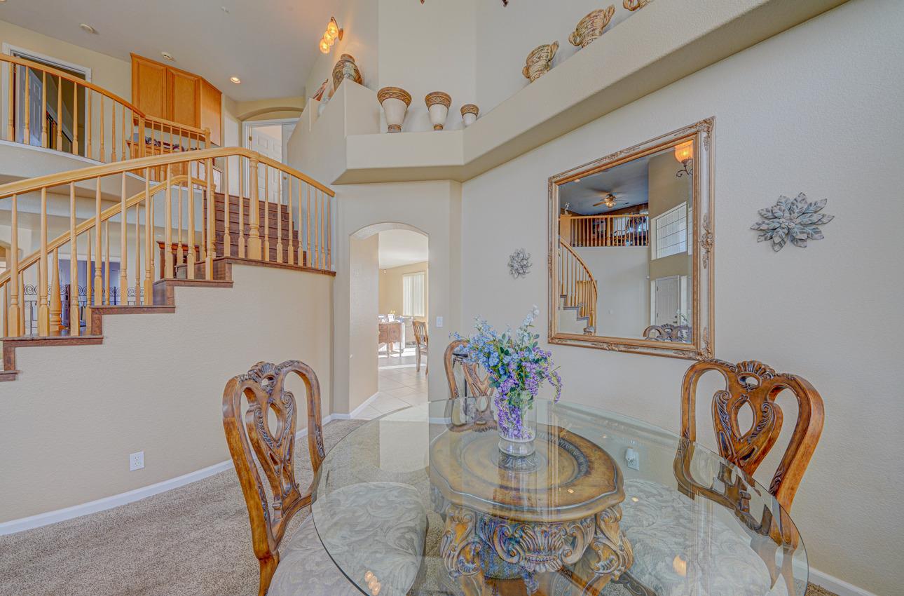 2 Whitman Circle Salinas, CA 93906 - Photo 10 of 41 a dining room with furniture potted plants and wooden floor