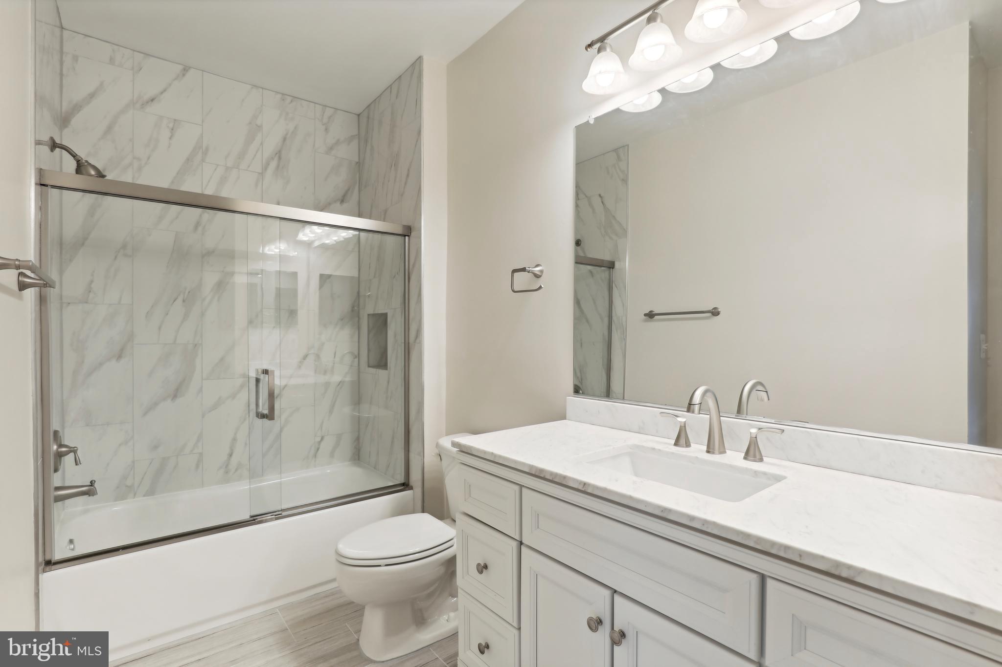 1505 North Point Drive, Unit 202 Reston, VA 20194 - Photo 8 of 12 Primary Bathroom