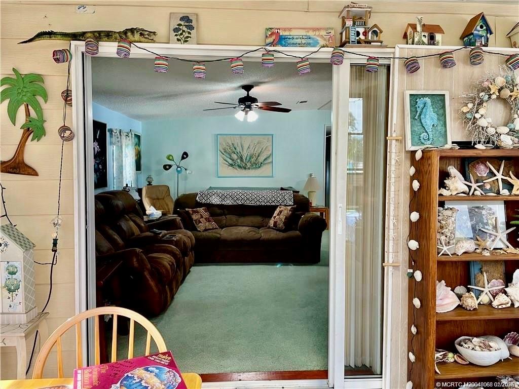 16236 Southwest Three Wood Way Indiantown, FL 34956 - Photo 19 of 26 a living room with furniture