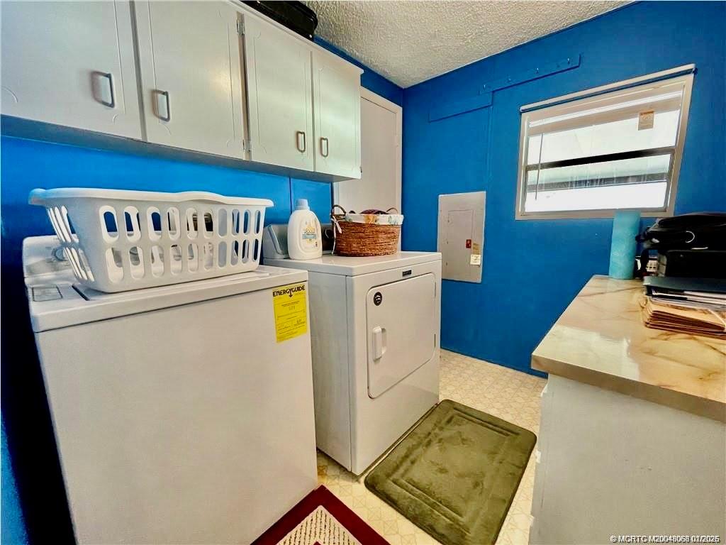16236 Southwest Three Wood Way Indiantown, FL 34956 - Photo 9 of 26 a view of a kitchen with fridge and wooden floor