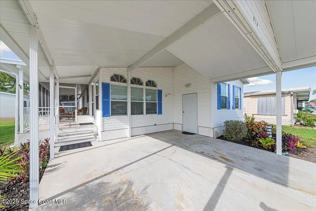 a view of a house with a garden