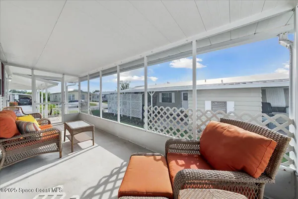 a outdoor living space with furniture and a couch