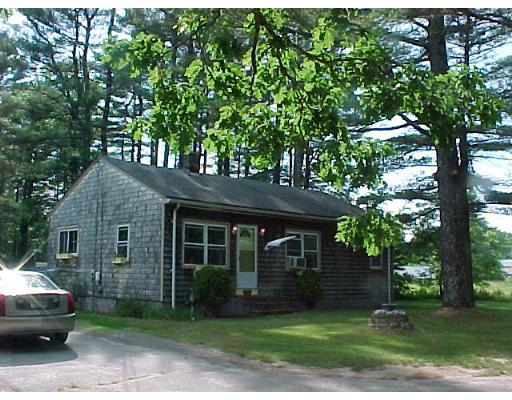 127 County Road Freetown, MA 02717 - Photo 1 of 3 a front view of a house with a garden